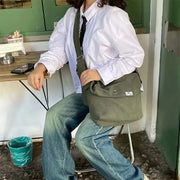 حقيبة الصليب باللون الأخضر الزيتوني